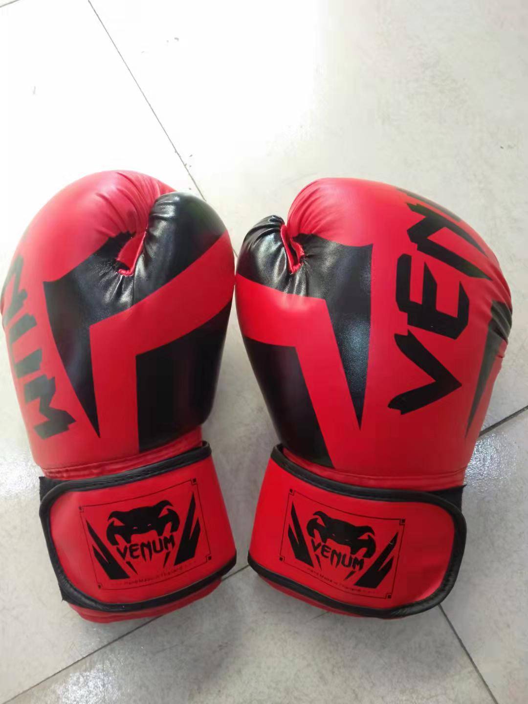Red adult boxing gloves